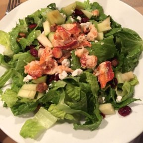 Gluten-free salad topped with lobster from Canoe Restaurant & Tavern